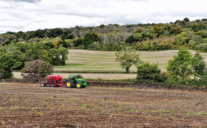 A tractor in a field in the London Green Belt